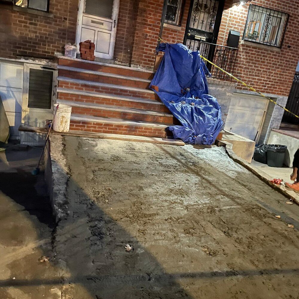 Concrete stoop rebuild in Morris Park, Bronx after